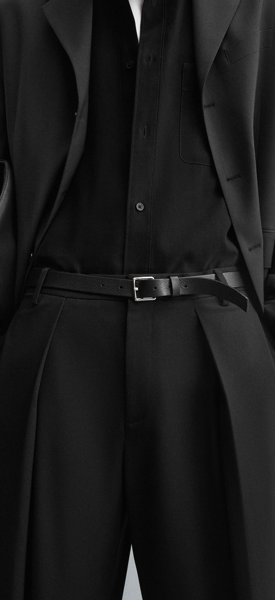 PLEATED TROUSERS