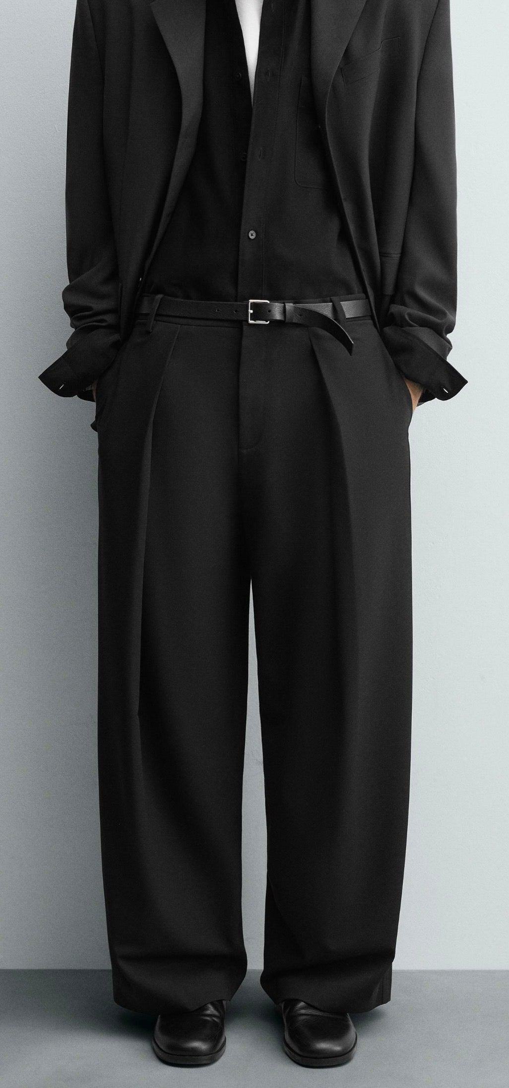 PLEATED TROUSERS